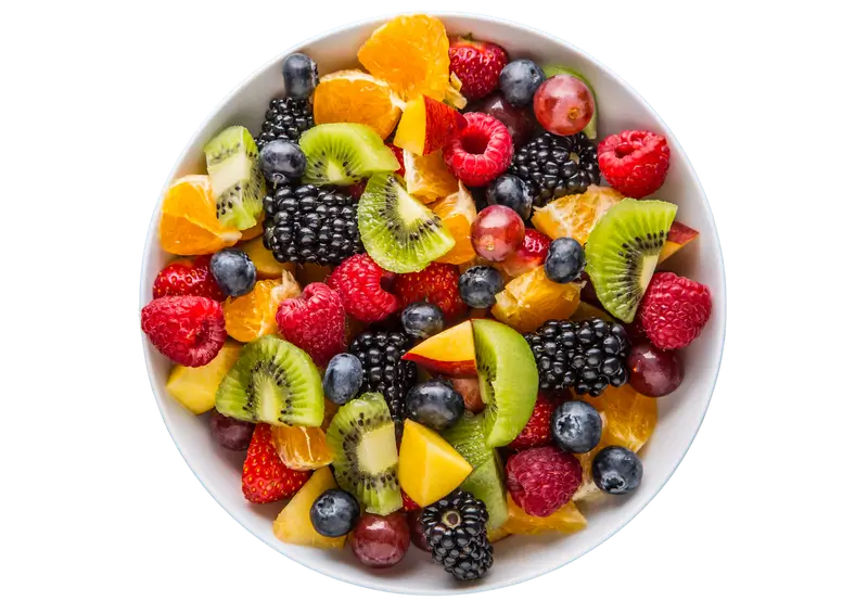 Bowl of assorted fresh fruit slices.