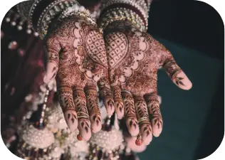 Bridal hands with intricate henna designs